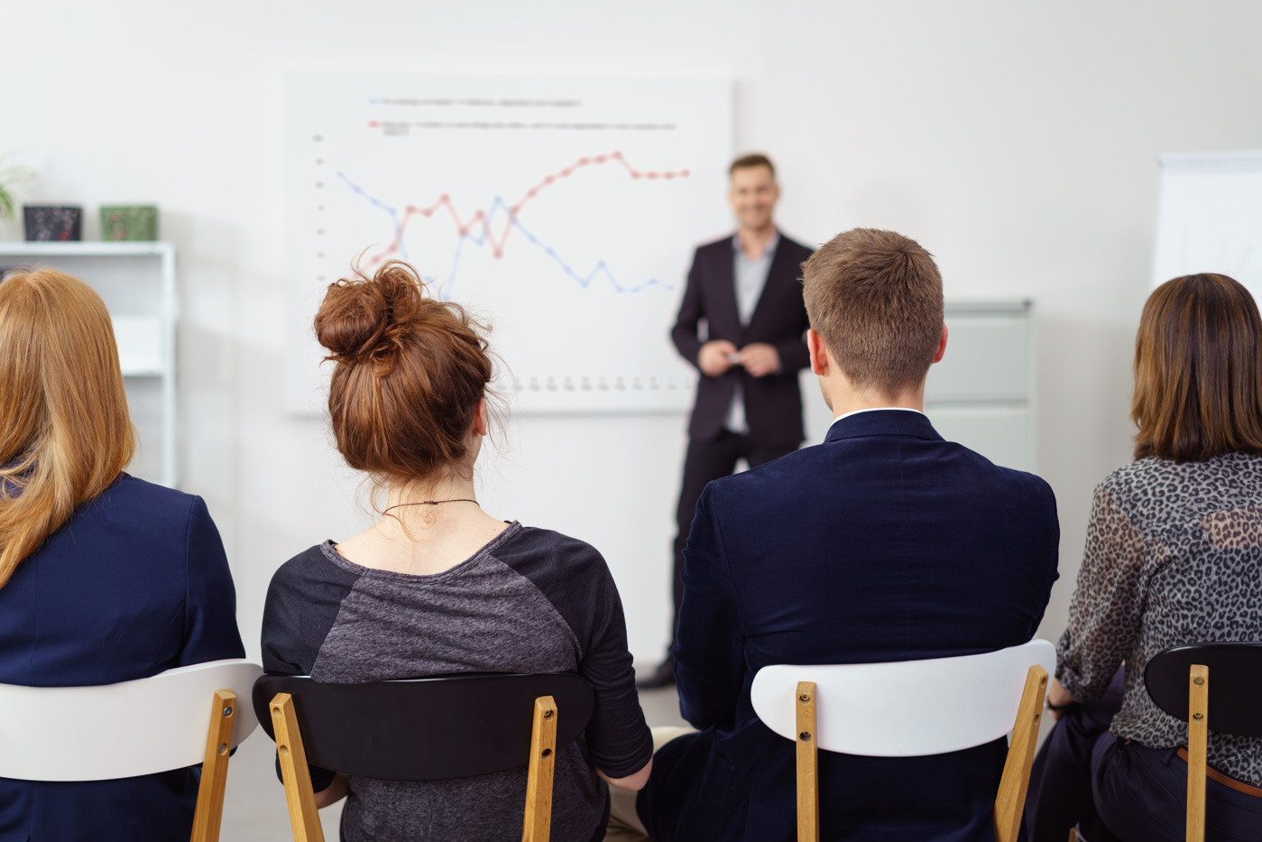 Teilnehmende eines Marketing-Seminars